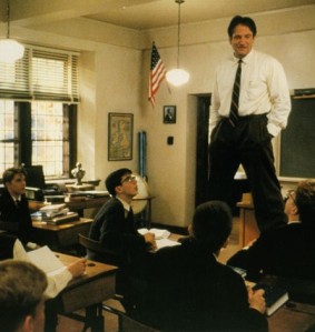 John Keating, Robin Williams, standing on his desk